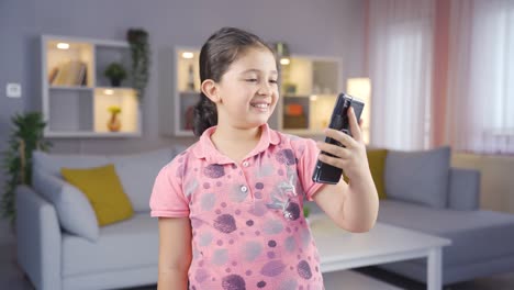 Girl-child-making-a-video-call-on-the-phone.